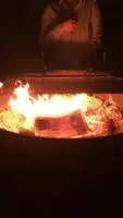 Staying nice and toasty by the campfire