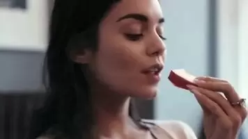 Vanessa Hudgens enjoys putting something in her mouth. Just look how she wraps her lips around it...