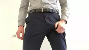 Hard at work - blue slacks bulging then reveal.