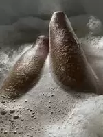 Having a bath and showing my legs to you...