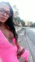 Renata Barbosa casually stroking outside.