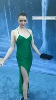 Maisie Williams in a new green dress. I really want to fondle her perky breasts and put my penis in her vagina.