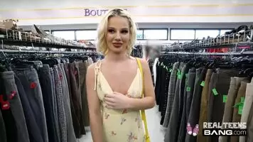 Bella Elise Rose flashes her perky tits in a busy store