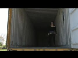 Girl in Empty Container Lorry