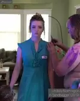 Lindsey Normington getting stripped in 'Sandbagger'