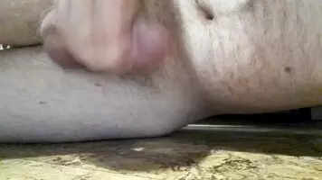 Laying on the floor cumming