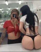Camgirls smack each others ass in public