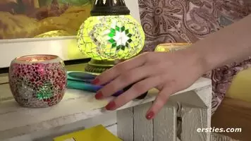 Lisa and Sam play with a dildo.