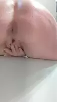 Fingering my pussy over the bathtub.