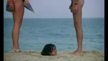 Facial while buried on the beach