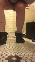 She pees in a vase