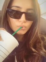 Tara Sutaria was in a hurry to catch a flight , so she made a bunch of men to cum in a cup and now she is sipping it on the flight !