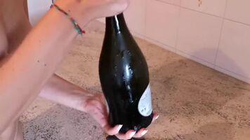 Draining champagne bottle with a blowjob