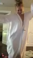 Blonde in onesie showing off