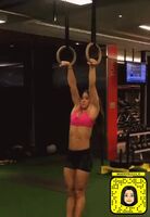 She's doing this muscle-up in real time