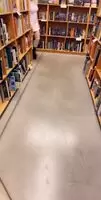 Busty petite at the bookstore