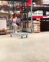 Climbing The Shopping Cart And Showing Her Ass