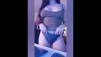 Asian plays with pussy on webcam