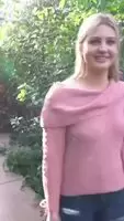 Flashing her boobs in the butterfly garden