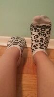 Stretching my feet out for you, this kitty loves her leopard print ;)