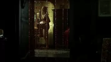Melissa George taking her dress off