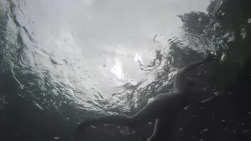 Kat Malone skinny dipping in the Smith River by Me. 2019.