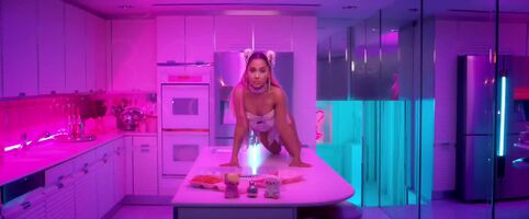 Ariana Grande looking like a snack I'd love to taste in her new music video is what I needed today